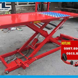 ban nang xe may dap chan ban nang co